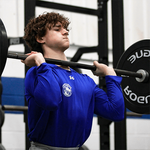 Strength training in the weight room at Blue Ridge School.