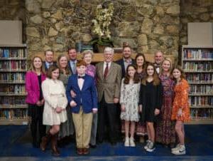 John Young and his family at the dedication of the new library.